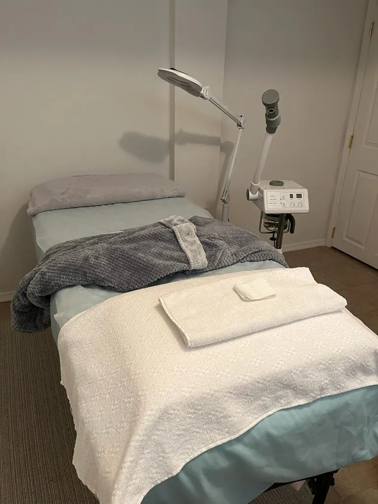photo of the treatment bed and equipment inside The Retreat Spa Suite